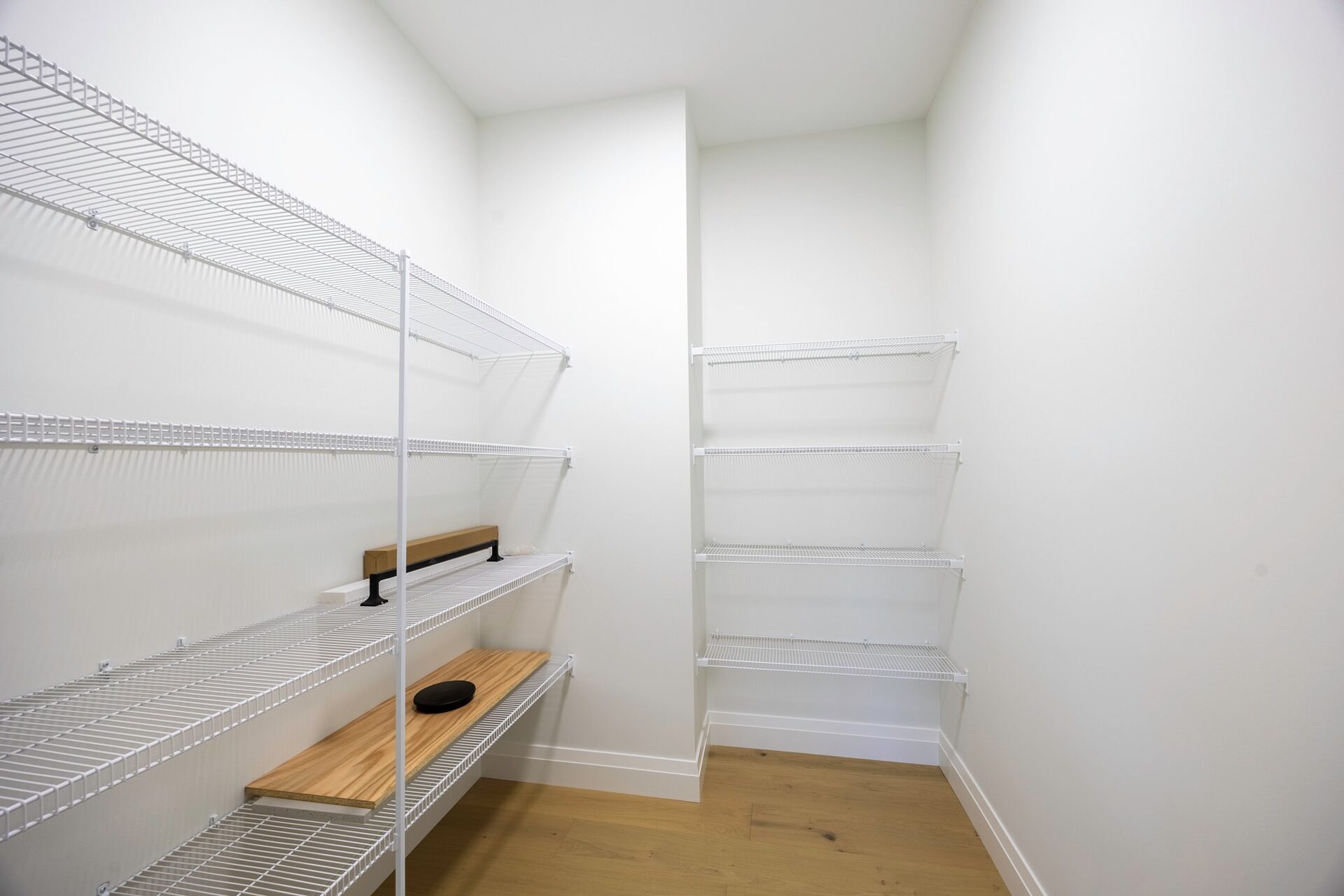 Walk-in pantry with full-height wire shelving